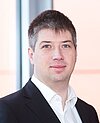 Steffen Späthe ist Technischer Geschäftsführer der Navimatix GmbH aus Jena und verantwortet innovative Softwarelösungen in den Bereichen Automotive, IoT und Telematik. Portrait von Steffen Späthe, Technischer Geschäftsführer der Navimatix GmbH aus Jena.